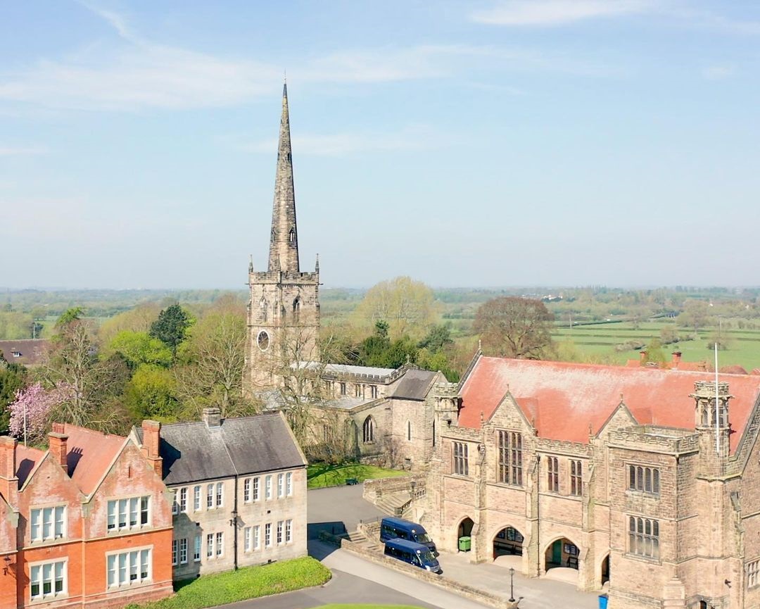 Outdoor photo of Repton School with chapel in the background