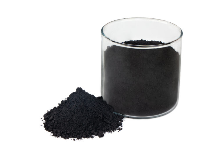 Black powder activated charcoal in glass